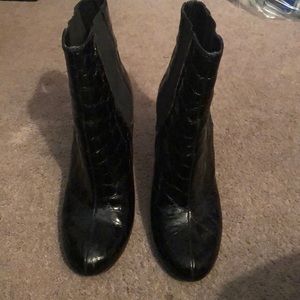 patent crocodile leather ankle boots.
